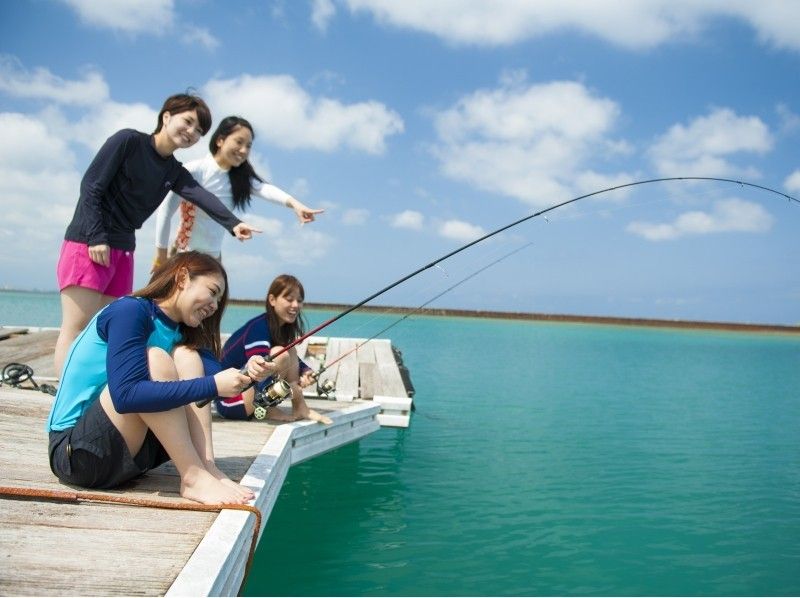 Women fishing on the pier