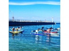 【Osaka · Kinki in front】 40 minutes from Osaka city! Relaxing on the beautiful sandy beach where you can see the airplane SUPYOGA SUP Ocean Yoga! Image of