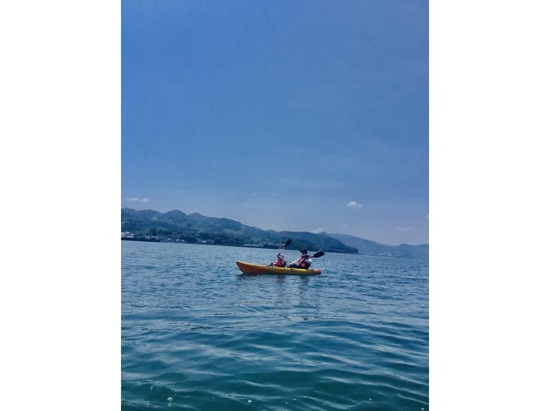 Amakusa Kayak cruising without getting wet while wearing a free rental long torso