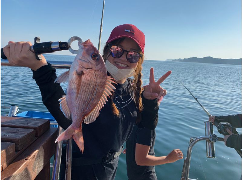 A woman enjoying sea fishing at With-Ocean in Katsuura, Chiba