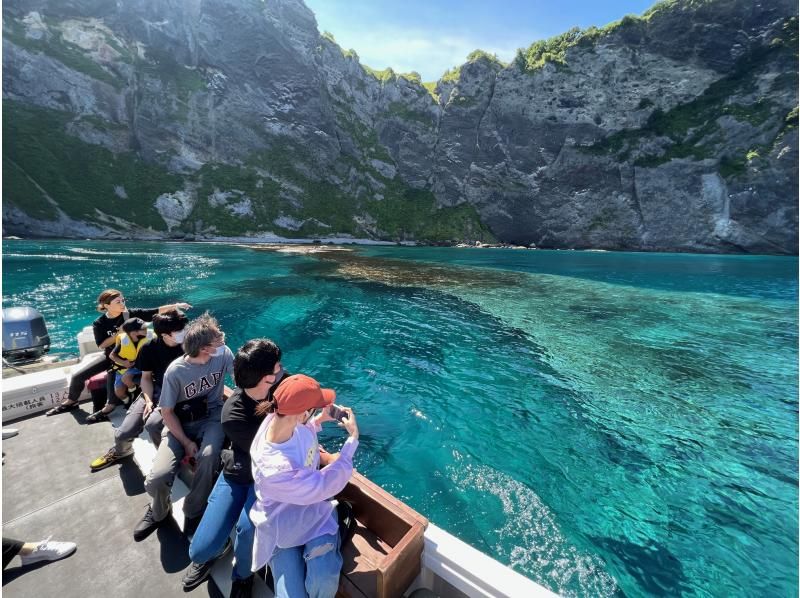 Hokkaido Otaru Blue Cave Cruising Passengers enjoying photography