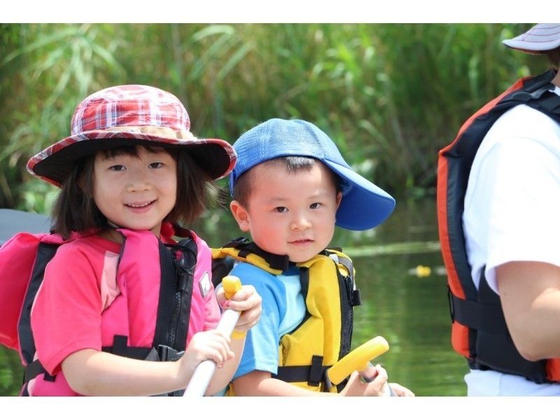 Children enjoying canoeing on the Bimi River