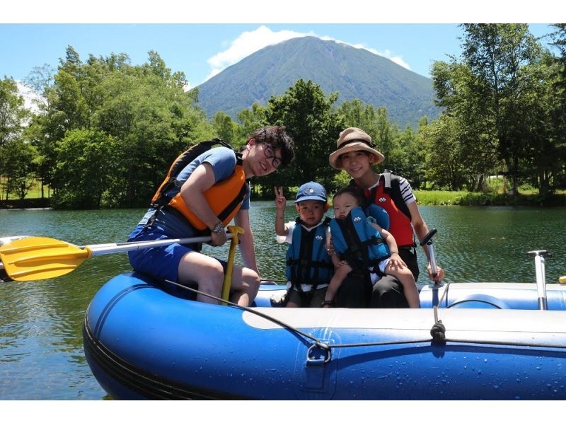 Hokkaido sightseeing Parents and children enjoying rafting Mt. Yotei Smiling children