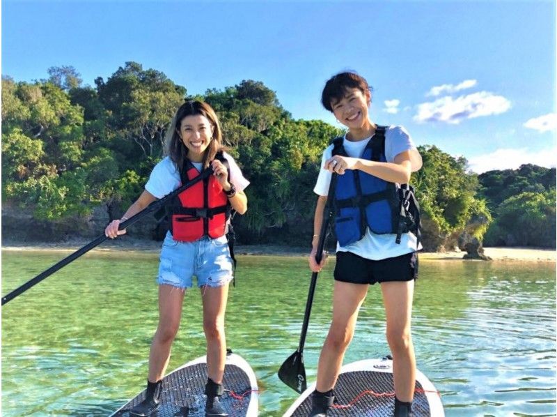 A couple enjoying mangrove SUP in Kabira Bay Ishigaki Island Tour Guide All