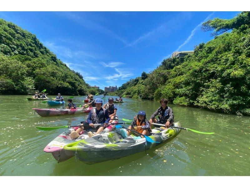 People enjoying a kayak tour with Hijagawa Kayak