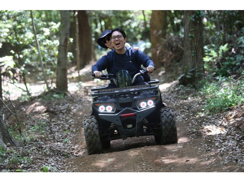 Couple enjoying buggy experience at CIMAX in Chiba