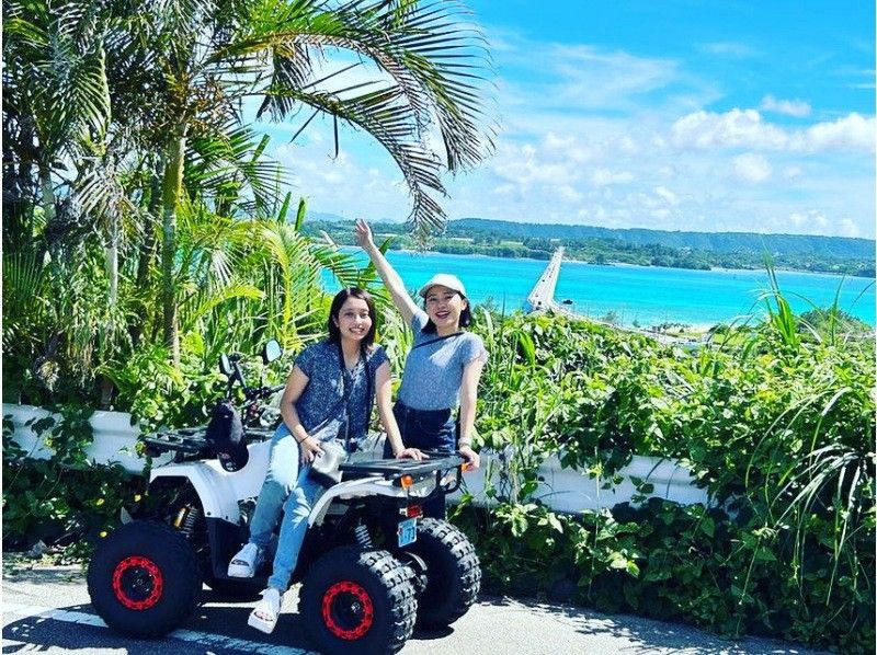 Okinawa Buggy Rental VAMONOS Woman enjoying 4-wheel buggy experience