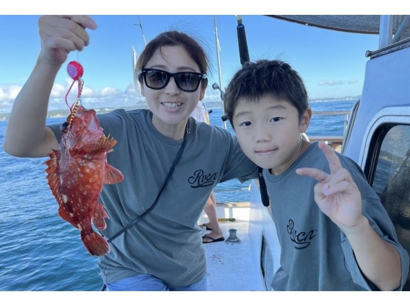 Parents and children enjoying a sea fishing tour at "With-Ocean" in Katsuura, Chiba