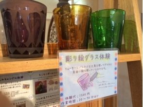 プランの魅力 A sample work is displayed at the entrance of the store の画像