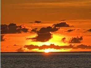 プランの魅力 水平線に沈む夕日 の画像