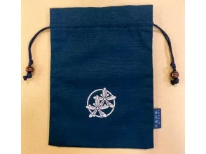 プランの魅力 (Production example) A drawstring purse made with individual flower patterns. の画像