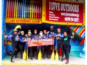 Group photo in front of i love outdoors base