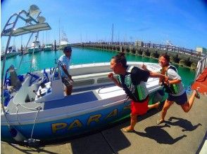 Board a parasailing ship.