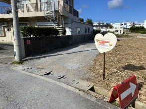 臨時駐車場へウエットスーツの返却　