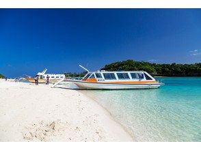 Experience a glass-bottom boat ride in Kabira Bay!