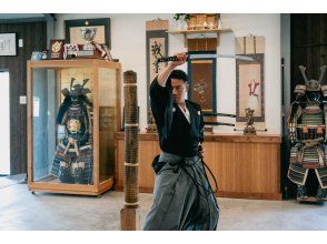 Demonstration of sword cutting by the instructor