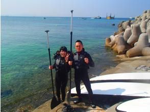 Snorkeling in the sea of tropical fish and coral reefs
