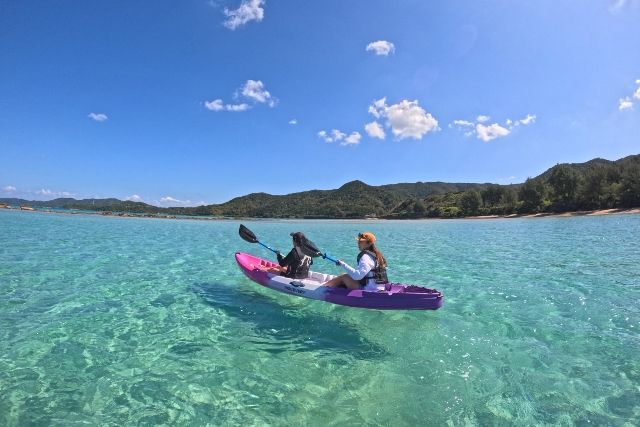 Two women enjoying a sea kayaking tour at Amami Sealand, Amami Oshima, Kagoshima