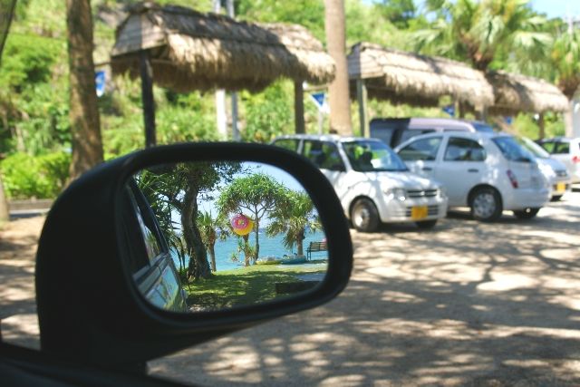 Amami Oshima Travel Rental Car Amami Oshima Beach reflected in the door mirror