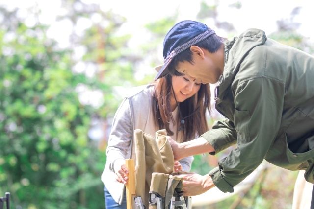 couple getting ready for camping