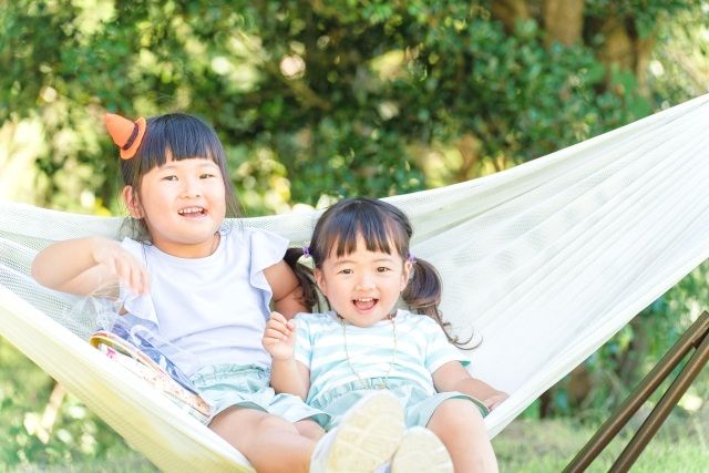 Children enjoying family camping