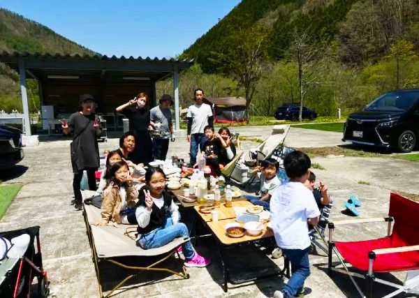 People enjoying camping at Kurumi Land, a Gifu Prefecture business