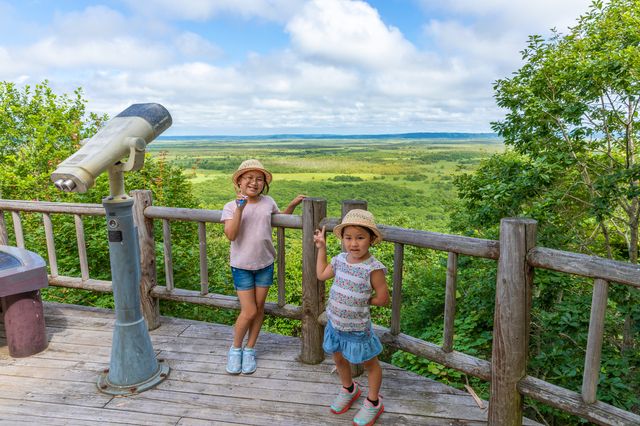 Hokkaido Kushiro Marsh Observatory and smiling sisters Children