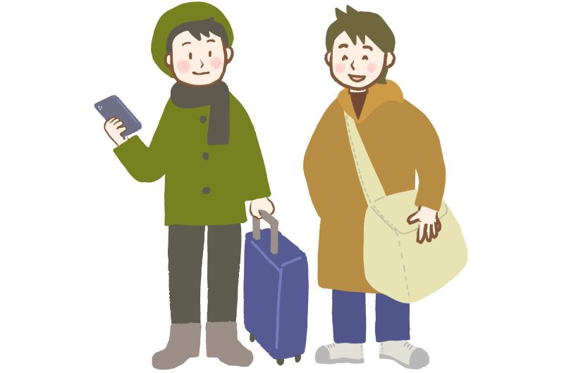 Two men who enjoy traveling in winter