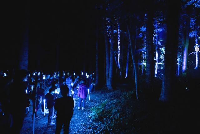 Kamuy Lumina Participants holding rhythm sticks Adults Children