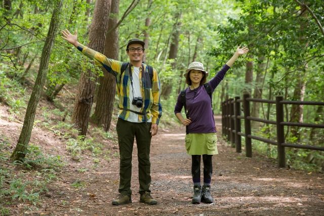 Middle-aged men and women enjoying hiking