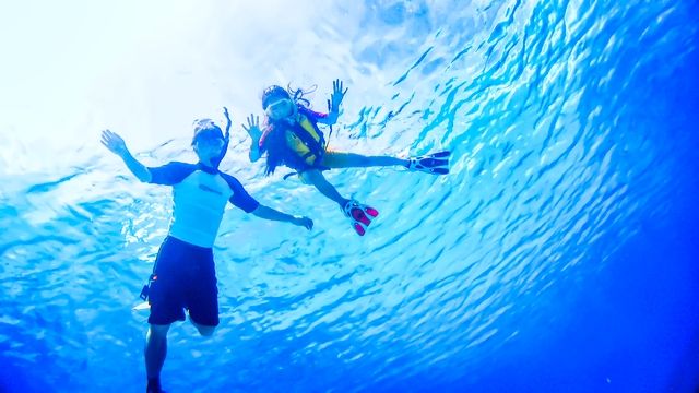 Children enjoying snorkeling in the Kerama Islands