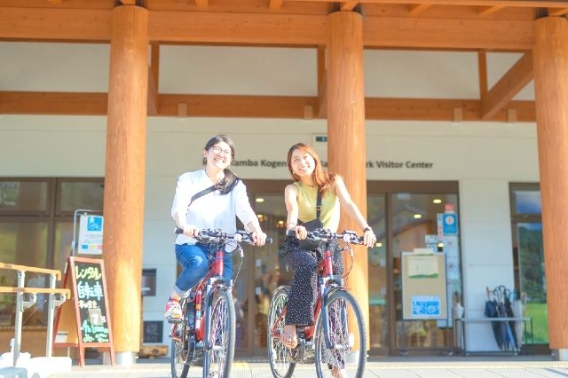 "Nantan City Miyama Tourism and Urban Development Association" A duo of women enjoying cycling in Kyoto