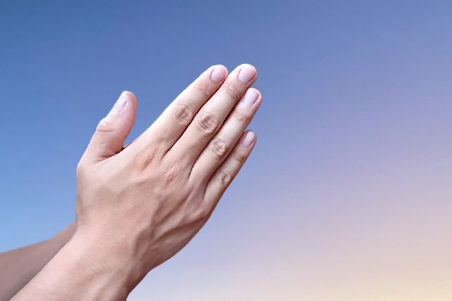 hands of a praying person