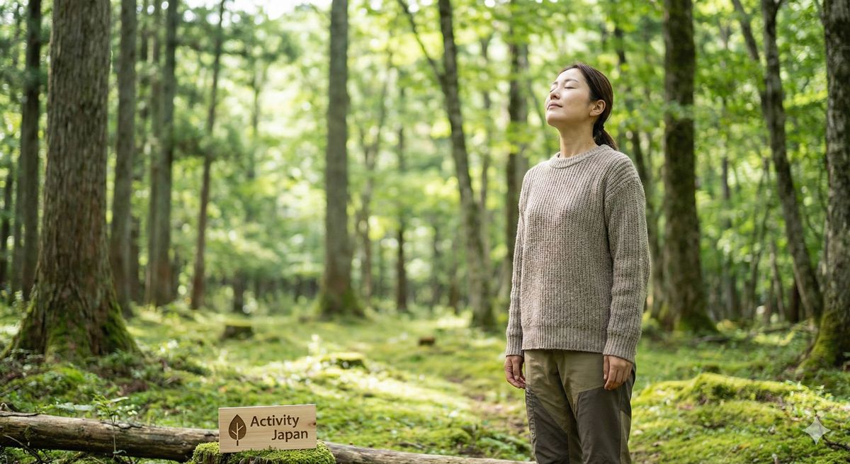 静かな森の中で深呼吸をして、心身ともにリラックスしている女性のイメージ