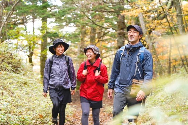 "Thousandth" A woman enjoying a trekking tour at the foot of Mt. Fuji in Yamanashi